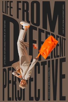 a man is upside down with an orange umbrella