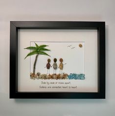 three birds sitting on rocks under a palm tree with a poem written below the frame