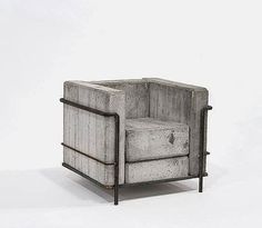 a concrete chair with metal frame and footrests on an isolated white background,