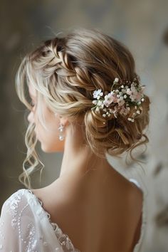 These effortlessly chic styles are perfect for outdoor weddings or bohemian-themed celebrations, adding a touch of whimsy and romance to your look. Wedding Hairstyles Loose Bun, Wedding Updo Styles, Outdoor Wedding Updo, Wedding Hairstyles No Veil, Floral Updo Wedding, Wedding Hairdos For Long Hair Updo, Fairy Wedding Hair Updo, Indian Hair Wedding, Wedding Hair Updo With Flowers