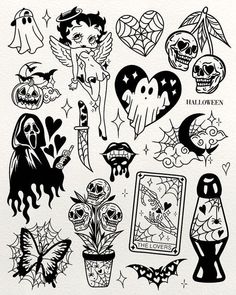 an assortment of halloween tattoos on white paper