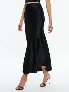 Evening Draped Midi Skirt, Sleek Evening Skirt For Spring, Sleek Long Skirt For Night Out, Silk Asymmetrical Skirt For Night Out, Chic Satin Bias Cut Maxi Skirt, Sleek Long Maxi Skirt For Spring, Chic Silk Pencil Skirt For Night Out, Chic Bias Cut Maxi Skirt, Sleek Asymmetrical Lined Skirt