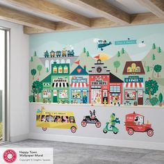 a wall mural in a children's room with cars and trucks painted on it