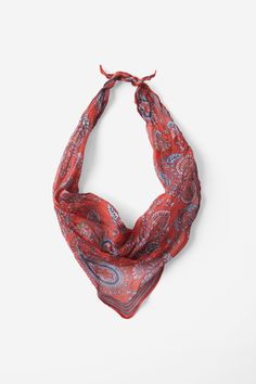 a red and blue paisley print scarf on a white background