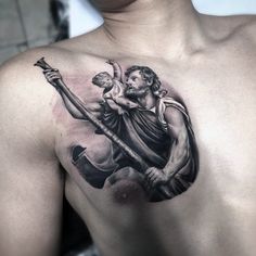 a man with a tattoo on his chest holding a hammer and an angel behind him