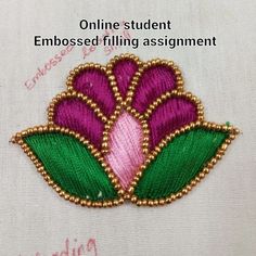 embroidered flower with green leaves and pink center on white fabric, text reads online student embossed filing assignment