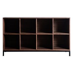 an open bookcase with many compartments on the top and bottom, against a white background