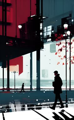 a man is walking down the street in front of some tall buildings with red leaves on them