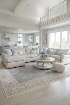 a living room filled with furniture and white walls