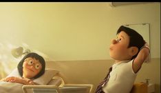 a cartoon character sitting in a hospital bed next to a woman with her head up