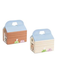 two cardboard boxes with animals on them sitting next to each other in front of a white background