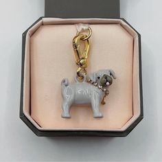 Please visit  for more products and promotions. Juicy Couture pug charm. No box is included! The box in photo is for display only! I did not keep all the charm boxes when I store them. Retired charm! Hard to find! I combine shipping. Note: Some charms I have for sale are reproduced from the original Juicy Couture factory, others are from my own collection in the past 10 years.  All Juicy Couture charms are all from the same factory no matter the reproduction ones or the ones were produced from 2 Juicy Couture Charms, Charm Bracelets, Juicy Couture, Pug, Jewelry Bracelets, Shoe Jewelry, The Past, Matter, Accessory Gift