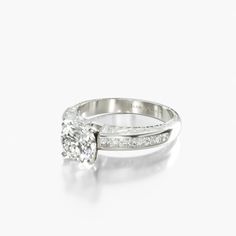 a diamond ring on a white background