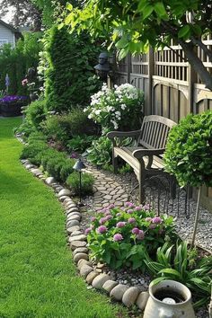 a bench sitting in the middle of a lush green yard