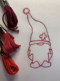 the embroidery design is being worked on with crochet