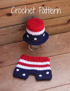 two crocheted hats, one with stars and the other has a red white and blue hat