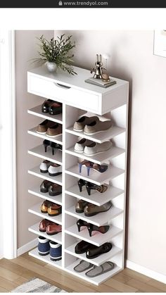 a white shoe rack filled with lots of shoes