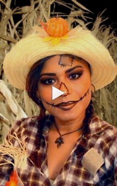 a woman wearing a scarecrow hat and makeup