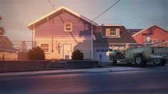 two story house on the corner of a street in front of some houses with garages