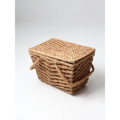 two wicker baskets stacked on top of each other