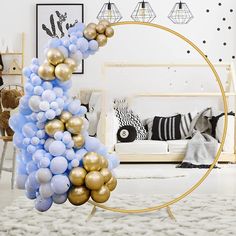 a living room filled with furniture and balloons in the shape of a circle on top of a rug