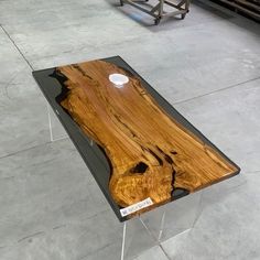 a table made out of wood and glass