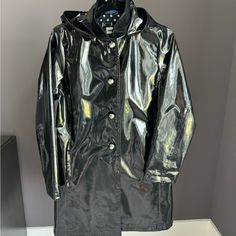 Never Worn! Retails For $395 At Saks! Size Xs. However, This Rain Coat Has On Oversized Cut So Definitely Will Fit Like A Small. Jane Post's Iconic Princess Rain Coat Features A Detachable Hood, Spread Collar, And Side Slip Pockets. A Vinyl-Like Texture And Button-Front Closure Complete This Longline Style. Detachable Hood Spread Collar Long Sleeves, Button Cuffs Side Slip Pockets Button-Front Closure 100% Polyurethane Lining: 100% Polyester Spot Clean Royal Blue Jacket, Pvc Raincoat, Grey Trench Coat, Vintage Cape, Tie Front Cardigan, Coat Pocket, Hooded Raincoat, Rayon Pants, Trench Coat Black