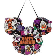 mickey mouse's happy halloween sign hanging on a wall