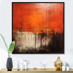 an abstract painting hangs on the wall above a console table with candles and vases