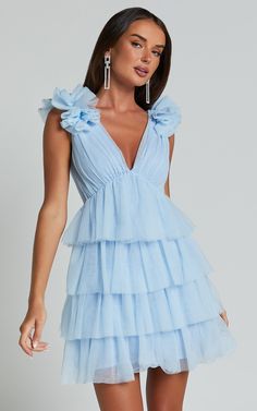 Flirty Light Blue Mini Dress, Light Blue Tiered Party Dress, Blue Tiered Party Dress, Blue Tiered Tulle Dress, Sleeveless Light Blue Mini Dress For Wedding, Elegant Blue Tulle Mini Dress, Flirty Light Blue Mini Dress With Ruffles, Light Blue Ruffled Evening Dress, Blue Backless Mini Dress For Wedding