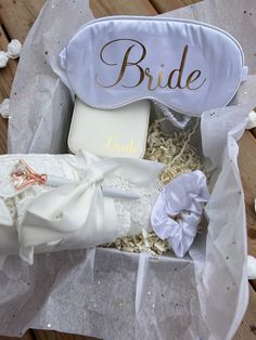 the bride gift box is filled with wedding garters