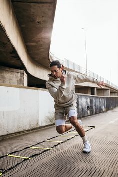 a man running while talking on a cell phone