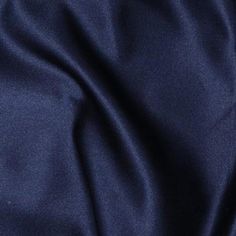 a close up shot of the fabric in dark blue color, it is very soft