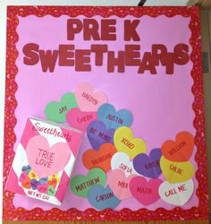 a sign that says pre k sweethearts hanging from the ceiling with hearts on it