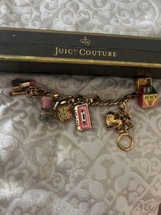 #juicycouture Handmade Charm Bracelet, Juicy Couture Charm Bracelet, Gold Charm Bracelet Aesthetic, Juicy Bracelet, Juicy Couture Charms Bracelet, Juicy Couture Bracelet, Vintage Charm Bracelet