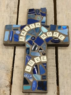 a cross that has been made out of tiles