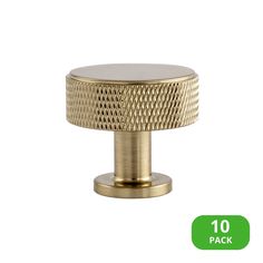 an image of a brass knob with the number 10 on it's front side