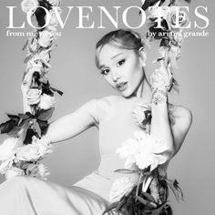 a woman in a white dress holding flowers on the cover of love no lies magazine