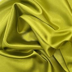 "Green Chartreuse Stretch Shiny Casino Fabric by the Yard - Style 842 Green Chartreuse Stretch Shiny Casino Fabric by the Yard, Bulk and Wholesale This 59\" Stretch Shiny Casino Fabric is stretchable and very shiny. This casino fabric adds a soft texture to any room and is ideal for use as upholstery and home crafts. Also perfect for sewing outfits, clothing, dresses, leggings, tops, arts and craft projects, all activewear and sports outfits, dance outfits, creative DIY projects, school projects, home textiles accents, stretch slipcovers for sofas, stools and all furniture and more!  Need More? Please contact us via Etsy with the quantity you need and we can create a listing for you. Price is per yard. Price is per yard. COLORS Different monitors causes photos to look paler or darker and w Stretchable Fabric Dress, Chartreuse Green Aesthetic, Chartreuse Aesthetic, Chartreuse Outfit, Chartreuse Color Palette, Cabaret Makeup, Chartreuse Fabric, Chartreuse Wedding, Sewing Outfits