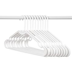 white plastic hangers are hanging on a rail