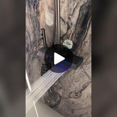 a shower head with water running from it