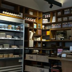 a store with shelves filled with food and condiments