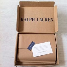 an open box with a note attached to it