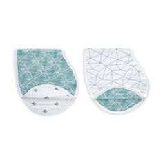 two bibs with blue and white designs on them