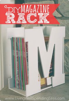 a magazine rack with books in it and the words diy magazine rack on top