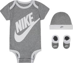 Fit & Design: Beanie: Rib knit fabric, contrast cuff Bodysuit: Soft rib knit fabric, large Nike Swoosh logo on front, lapped shoulders, snap closures at crotch Booties: Cotton blend fabric, contrast cuffs, Nike Swoosh logo Additional Details: Machine washable Bootie Socks, Baby Boy Outfits Swag, Baby Boy Swag, Baby Nike, Black Sportswear, Rib Fabric, Fashionable Baby Clothes, Cotton Bodysuit, Diaper Bag Backpack