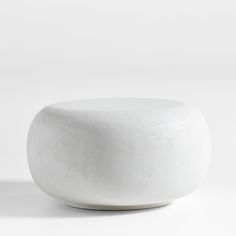 a white round object sitting on top of a table