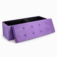 a purple planter sitting on top of a white floor