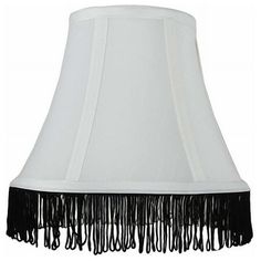 Urbanest silk bell lampshade in off white with black fringe.This shade measures 5" across the top, 9" across the bottom, and 7" slant height. The fringe measures 1 1/4" long and hangs from the bottom of the shade.Softback silk bell shape with spider-fitter. Maximum recommended wattage is 40 watts.Lined with white fabric.List price is for 1 shade. Size: Single. Fringe Lamp Shade, Fringe Lamp, Bell Lamp Shade, Bell Lamp, The Fringe, Black Fringe, Home Decor Lights, White Fabric, Lamp Shade