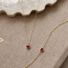 "Celebrate her birthday with this mesmerizing handrafted pendant design that features a shimmering red heart shape which suspends along an 18 inch 14k solid gold chain that secures it. RED*HEART*NECKLACE ‣ 2 Years Warranty ‣ Free Express International Shipping ‣ Free returns within 30 days from the order date Features * Made to Order. * Material: Solid Gold (real solid gold, no gold-filled or no gold plated material) * Gold KT: 14K * Gemstone: Enamel Stone * Length: 14\", 16\", 18\", 20\", 22\", 14k Gold Clavicle Chain Necklace For Valentine's Day, Red Heart Pendant Necklace In 14k Gold, Red 14k Gold Heart Pendant Necklace, Red 14k Gold Necklace For Valentine's Day, 14k Gold Tarnish-resistant Heart Necklace For Valentine's Day, 14k Gold Heart Necklace For Valentine's Day, 14k Gold Round Heart Necklace For Valentine's Day, Tarnish Resistant Round Heart Necklace For Valentine's Day, Tarnish Resistant Heart Necklace For Valentine's Day